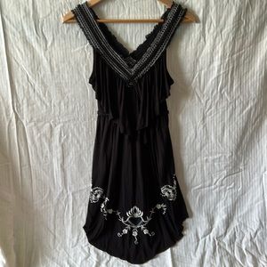 Free People black minidress with ruffles, laces and embroidery